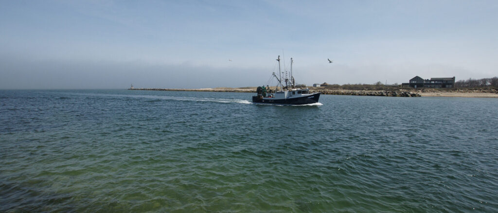 Fishing boat returning to port in Montauk